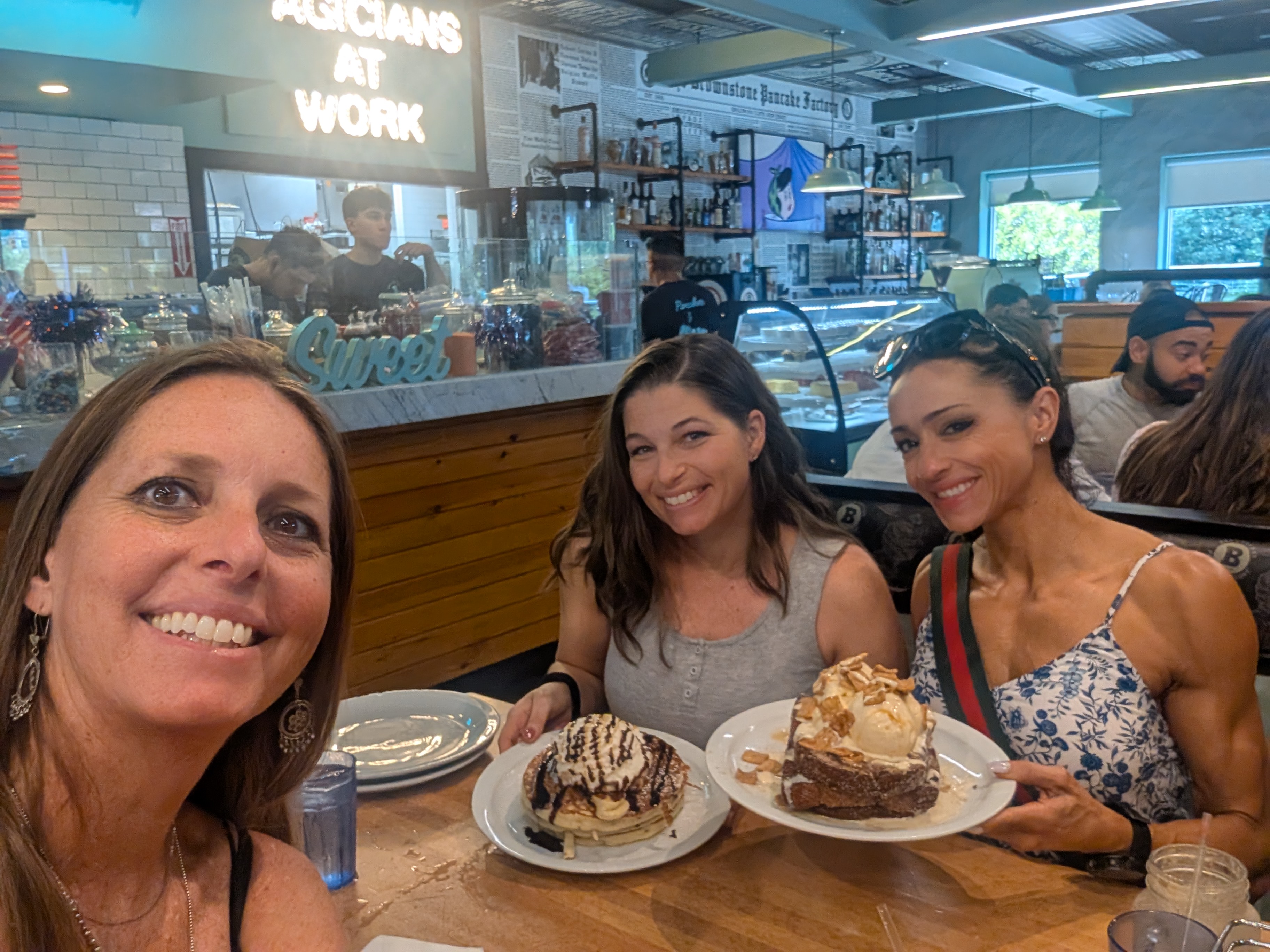 Lisa and friends enjoying dessert together